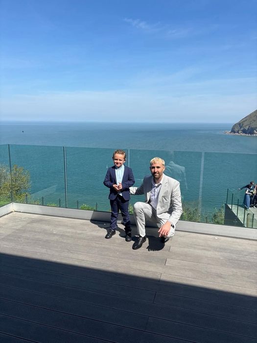 Picture Of The Owner With His Son